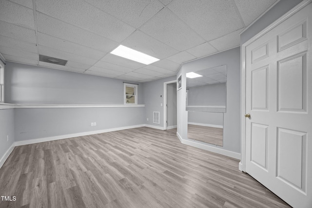 6001 Waters Way Dr, Raleigh, NC 27606 - unfurnished room with a paneled ceiling and wood finished floors
