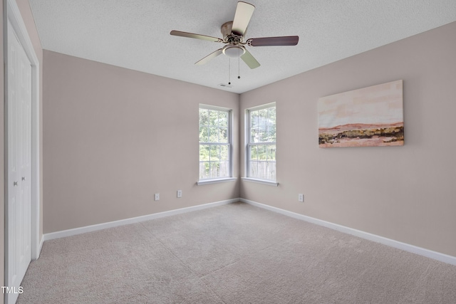 5000 Silverdene St, Raleigh, NC 27616 - carpeted spare room featuring a textured ceiling and ceiling fan