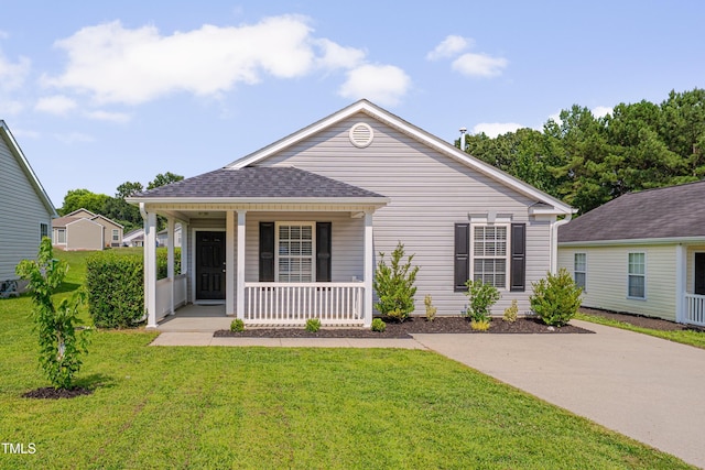 5000 Silverdene St, Raleigh, NC 27616 - view of front of house featuring a porch and a front yard