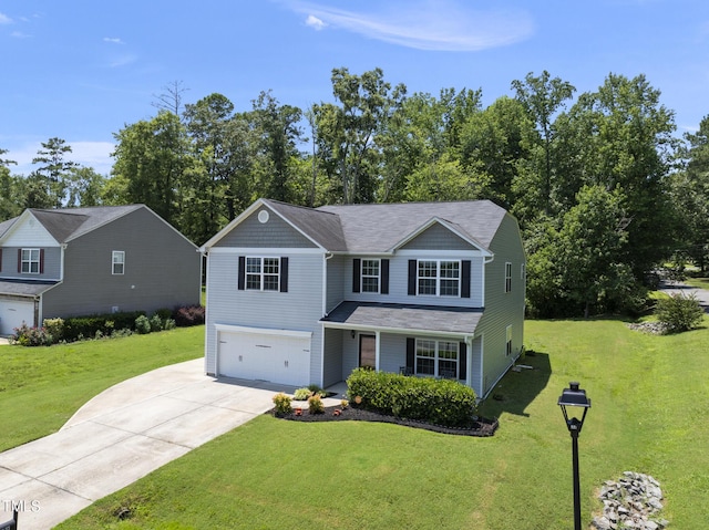 702 Pitch Pine Dr, Creedmoor, NC 27522 - traditional-style house with a garage, concrete driveway, a front lawn, and roof with shingles