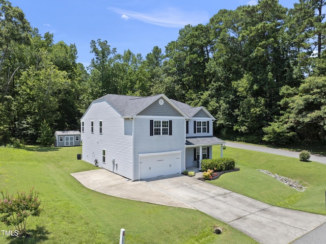 702 Pitch Pine Dr, Creedmoor, NC 27522 - view of front of home featuring an attached garage, concrete driveway, and a front yard