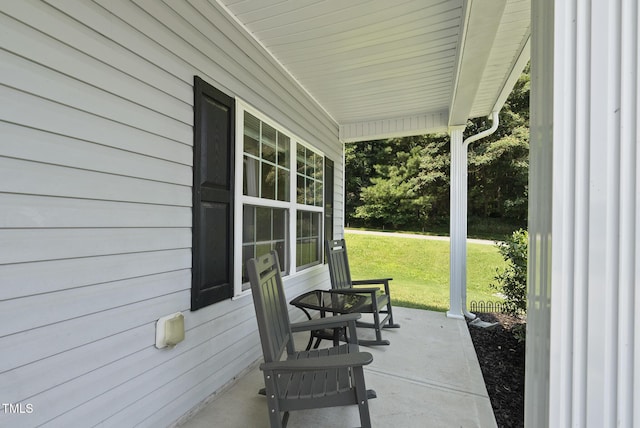 702 Pitch Pine Dr, Creedmoor, NC 27522 - covered porch with a lawn