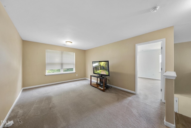 702 Pitch Pine Dr, Creedmoor, NC 27522 - carpeted empty room featuring baseboards and a smoke detector