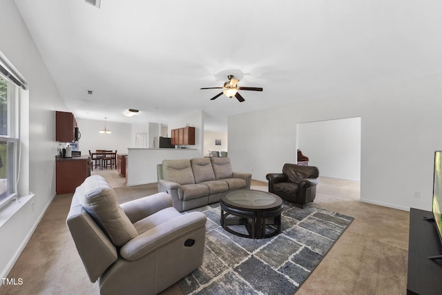702 Pitch Pine Dr, Creedmoor, NC 27522 - living room with carpet floors, ceiling fan, and a chandelier