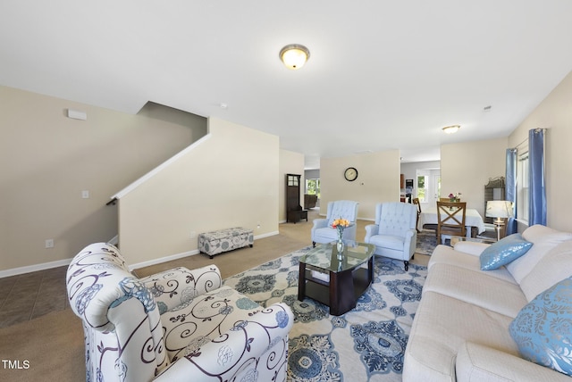 702 Pitch Pine Dr, Creedmoor, NC 27522 - carpeted living room featuring baseboards and stairs