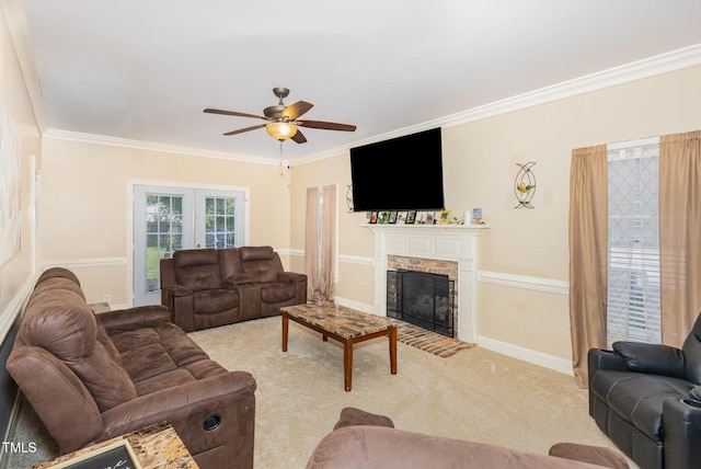 2906 Brentwood Dr N, Wilson, NC 27896 - living room with crown molding, a brick fireplace, ceiling fan, and light colored carpet