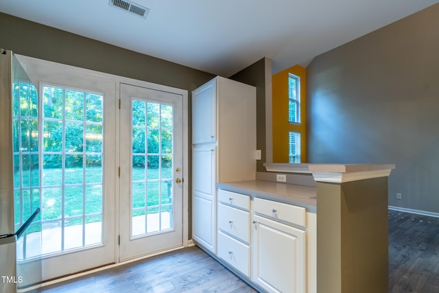 803 Creek Crossing Trl, Whitsett, NC 27377 - entryway featuring wood finished floors and healthy amount of natural light