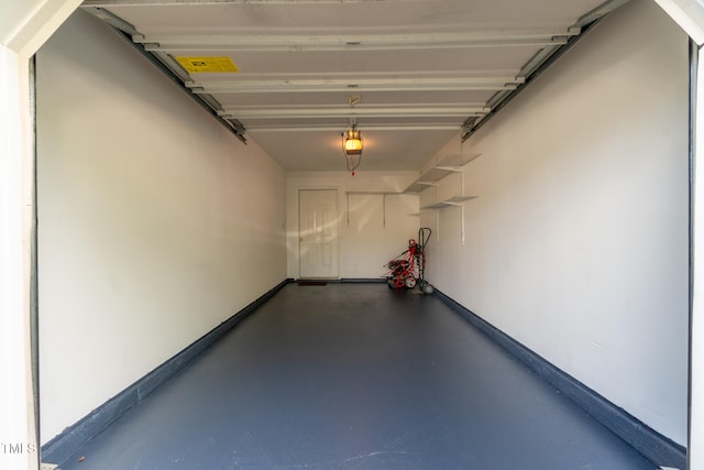 803 Creek Crossing Trl, Whitsett, NC 27377 - garage with a garage door opener