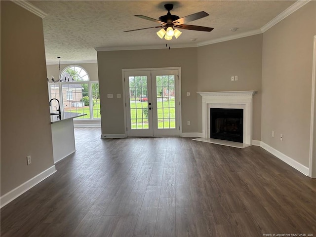 518 Maple Leaf Way, Lumberton, NC 28358 - unfurnished living room featuring dark wood-style floors, ceiling fan, a fireplace with flush hearth, french doors, and a textured ceiling