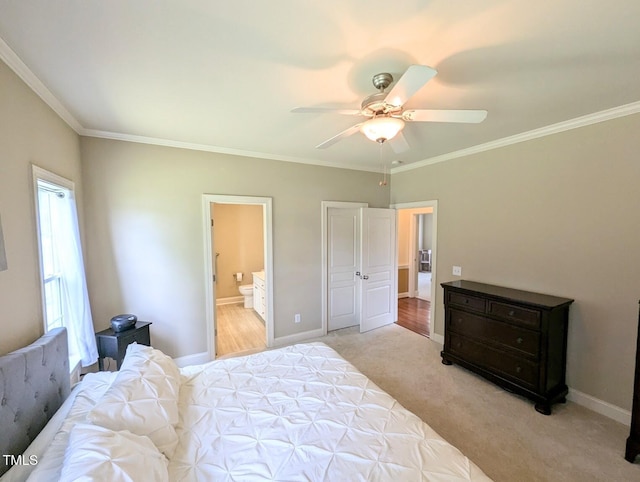 70 Dexterfield Dr, Fuquay Varina, NC 27526 - bedroom featuring ornamental molding, ensuite bathroom, light colored carpet, and a ceiling fan