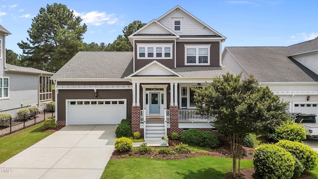 1508 Heritage Reserve Ct, Wake Forest, NC 27587 - craftsman house with a garage, covered porch, concrete driveway, and a front lawn