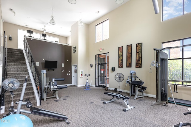 7250 NC-751 Hwy, Durham, NC 27707 - workout area featuring a towering ceiling, plenty of natural light, and carpet flooring