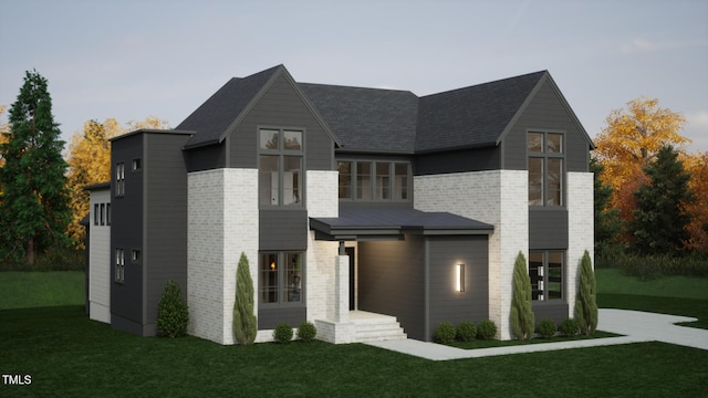 802 Warren Ave, Cary, NC 27511 - contemporary house featuring a front yard and brick siding