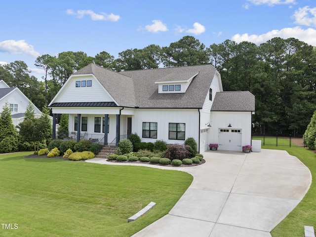 3829 Sleepy Brook Ln, Apex, NC 27539 - modern farmhouse style home with a garage, concrete driveway, a porch, board and batten siding, and roof with shingles