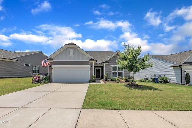 2626 Nassau Trce, Fuquay Varina, NC 27526 - craftsman-style home featuring an attached garage, driveway, a front yard, and board and batten siding