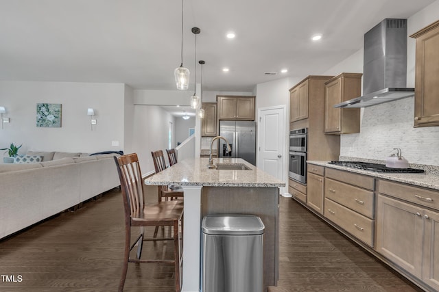 2626 Nassau Trce, Fuquay Varina, NC 27526 - kitchen with wall chimney exhaust hood, stainless steel appliances, open floor plan, decorative backsplash, and light stone countertops