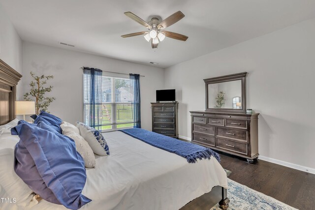2626 Nassau Trce, Fuquay Varina, NC 27526 - bedroom featuring dark wood-type flooring and a ceiling fan
