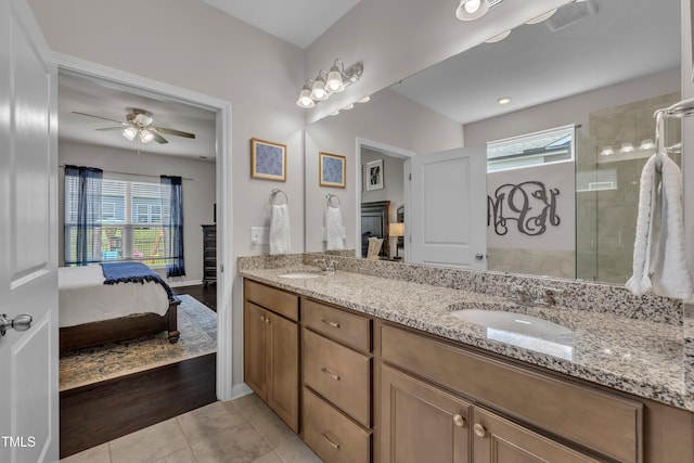 2626 Nassau Trce, Fuquay Varina, NC 27526 - bathroom featuring connected bathroom, double vanity, healthy amount of natural light, and ceiling fan