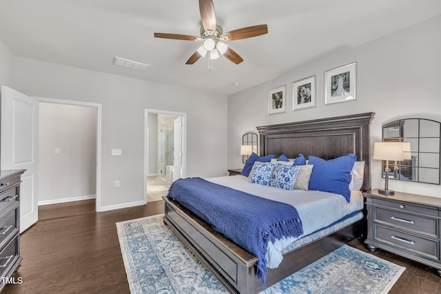 2626 Nassau Trce, Fuquay Varina, NC 27526 - bedroom with dark wood-type flooring, a ceiling fan, and ensuite bathroom