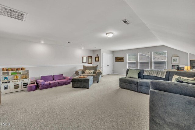 2626 Nassau Trce, Fuquay Varina, NC 27526 - living area featuring carpet floors and vaulted ceiling
