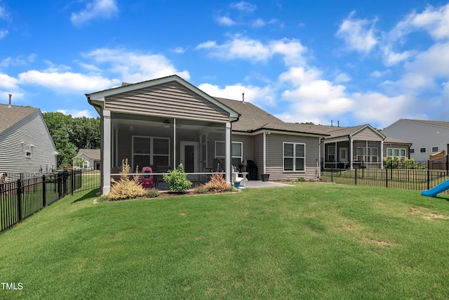 2626 Nassau Trce, Fuquay Varina, NC 27526 - rear view of property featuring a sunroom, a fenced backyard, a shingled roof, and a ceiling fan