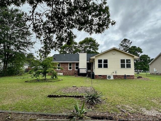 162 E Twelve Oaks Rd, Raeford, NC 28376 - back of property with crawl space