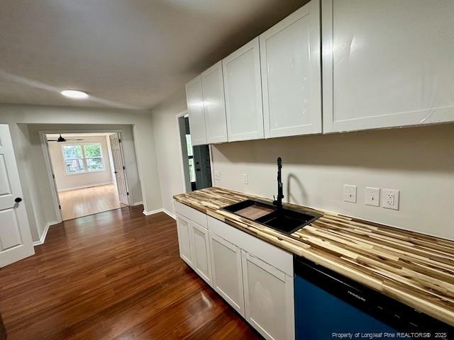 162 E Twelve Oaks Rd, Raeford, NC 28376 - kitchen featuring dishwasher, dark wood finished floors, white cabinets, and wooden counters