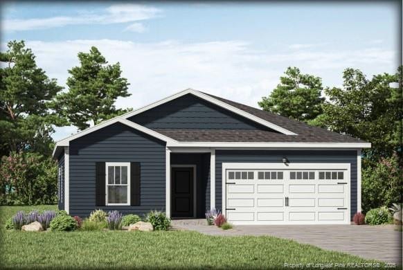 430 Windemere Dr, Fayetteville, NC 28314 - view of front of property with an attached garage, driveway, and a front lawn