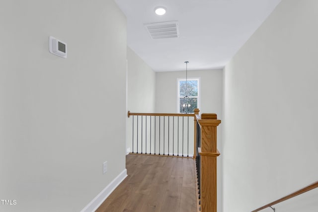 717 Utley St, Holly Springs, NC 27540 - hall with wood finished floors and baseboards