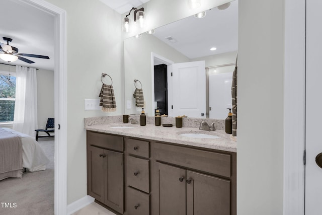 717 Utley St, Holly Springs, NC 27540 - bathroom featuring ensuite bath, double vanity, and ceiling fan