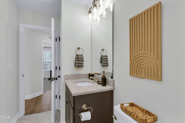 717 Utley St, Holly Springs, NC 27540 - half bath featuring vanity and toilet