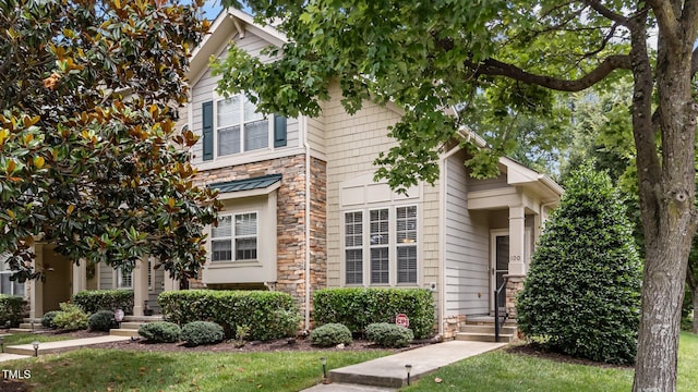 100 Tobacco Leaf Ln, Apex, NC 27502 - view of front of home featuring stone siding