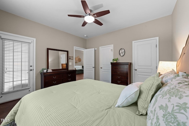 100 Tobacco Leaf Ln, Apex, NC 27502 - bedroom featuring dark wood finished floors and ceiling fan