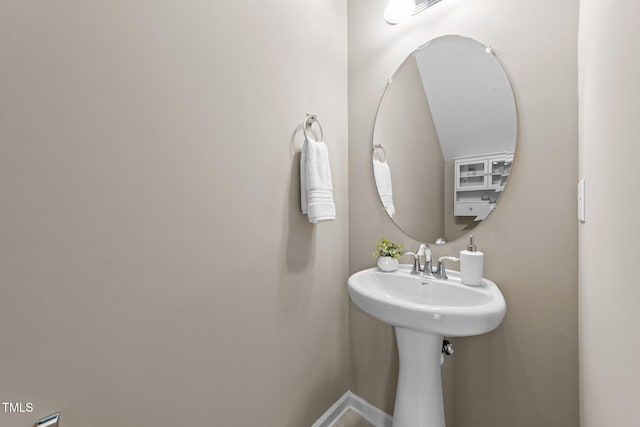 100 Tobacco Leaf Ln, Apex, NC 27502 - bathroom featuring baseboards