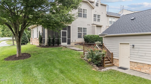 100 Tobacco Leaf Ln, Apex, NC 27502 - back of property featuring a lawn and roof with shingles