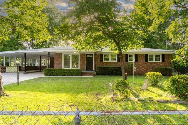 2110 Lombardy Dr, Fayetteville, NC 28304 - ranch-style home featuring an attached carport, brick siding, and driveway