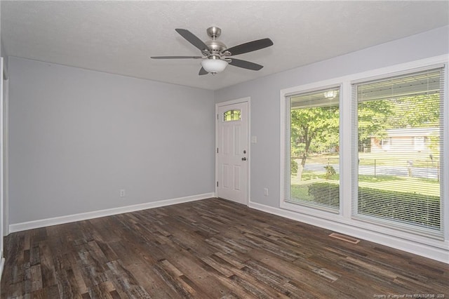 2110 Lombardy Dr, Fayetteville, NC 28304 - empty room with dark wood finished floors and a ceiling fan