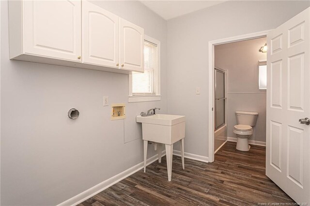 2110 Lombardy Dr, Fayetteville, NC 28304 - washroom featuring hookup for a washing machine, dark wood-style flooring, and cabinet space