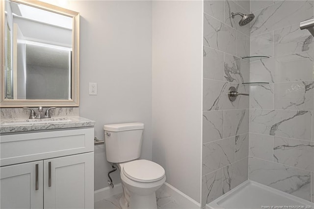 2110 Lombardy Dr, Fayetteville, NC 28304 - bathroom with a tile shower, vanity, and marble look tiles