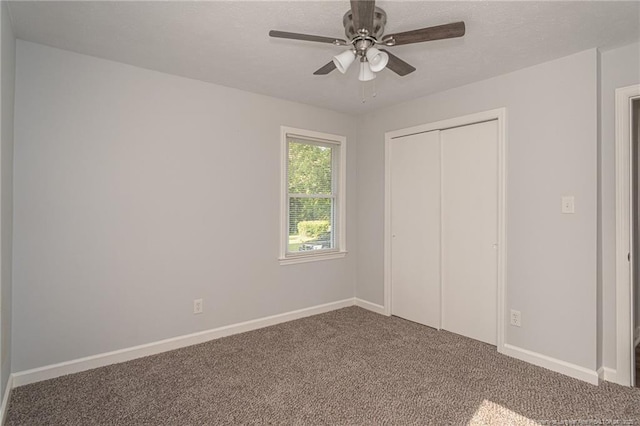 2110 Lombardy Dr, Fayetteville, NC 28304 - unfurnished bedroom with carpet floors, a closet, a ceiling fan, and a textured ceiling
