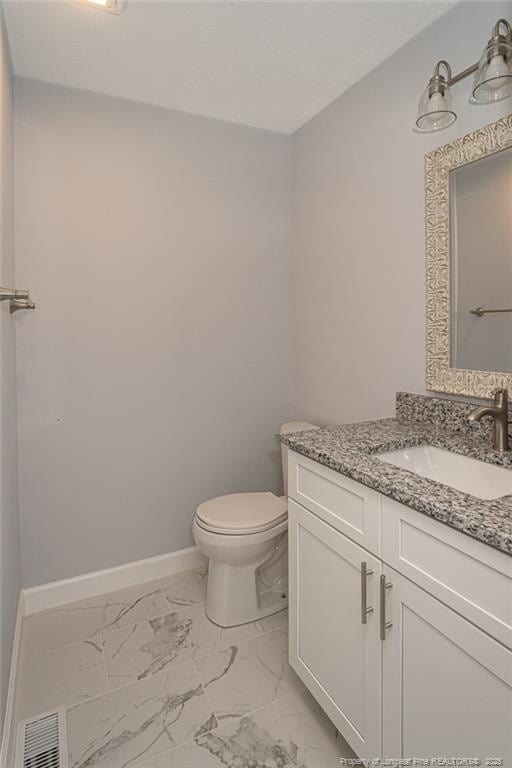 2110 Lombardy Dr, Fayetteville, NC 28304 - bathroom featuring marble finish floors and vanity