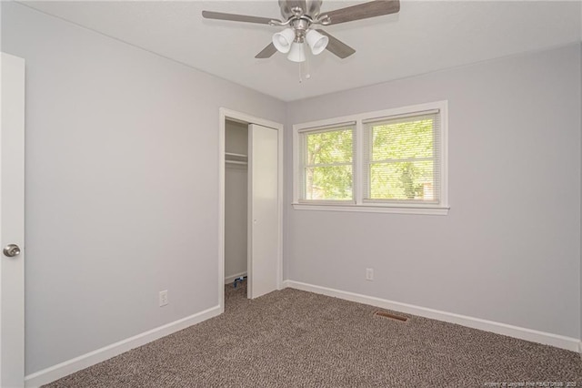 2110 Lombardy Dr, Fayetteville, NC 28304 - unfurnished bedroom featuring carpet flooring, a closet, and ceiling fan