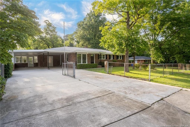 2110 Lombardy Dr, Fayetteville, NC 28304 - ranch-style house with concrete driveway, an attached carport, and brick siding