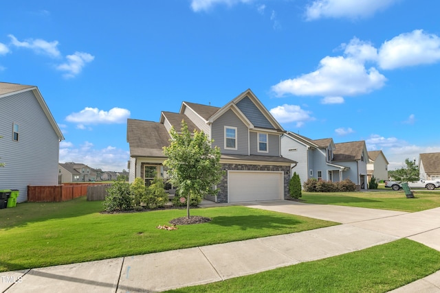 525 Willow Breeze Ct, Zebulon, NC 27597 - view of front facade with an attached garage, concrete driveway, a residential view, and stone siding