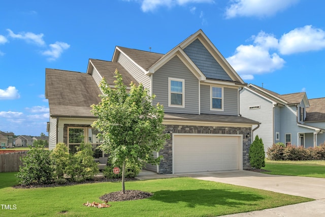 525 Willow Breeze Ct, Zebulon, NC 27597 - craftsman inspired home featuring concrete driveway, an attached garage, a shingled roof, and stone siding