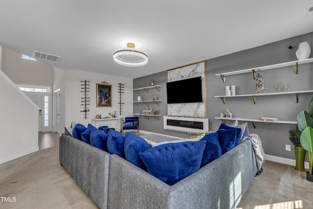 525 Willow Breeze Ct, Zebulon, NC 27597 - carpeted living area with baseboards
