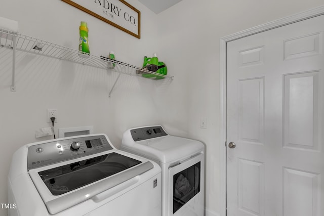 525 Willow Breeze Ct, Zebulon, NC 27597 - washroom featuring washing machine and clothes dryer