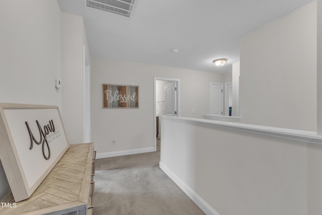 525 Willow Breeze Ct, Zebulon, NC 27597 - hallway featuring light carpet and baseboards