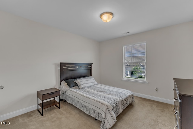 525 Willow Breeze Ct, Zebulon, NC 27597 - bedroom featuring light colored carpet