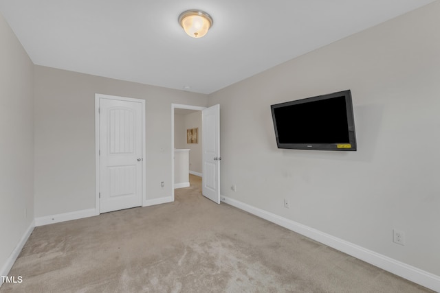 525 Willow Breeze Ct, Zebulon, NC 27597 - unfurnished bedroom featuring carpet and baseboards